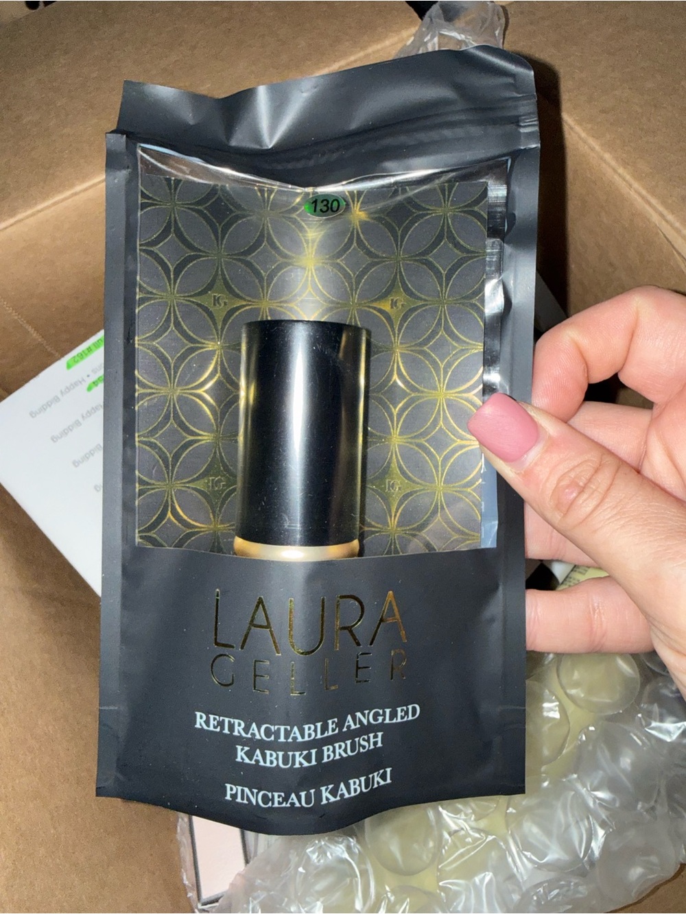 Laura Geller Black and Gold Retractable Angled Kabuki Brush
